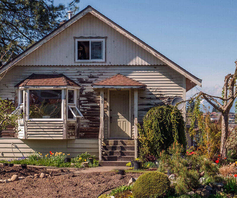 Exterior of a fixer-upper house.