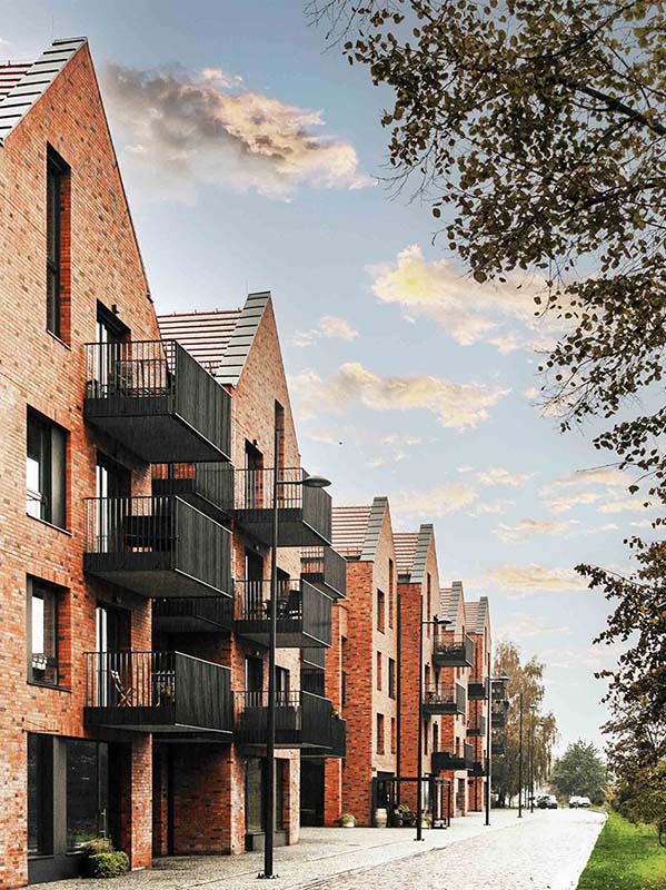 Outside of red brick multi-unit condo building.