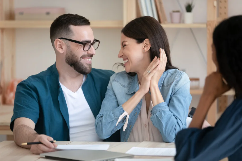 First-time homebuyers at the closing table