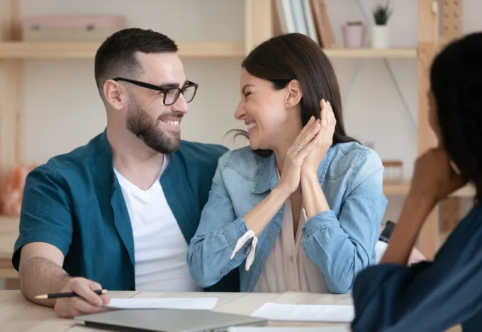 First-time homebuyers at the closing table
