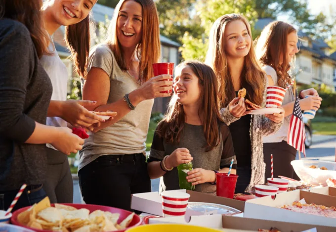 Neighbors hosting a block party together.