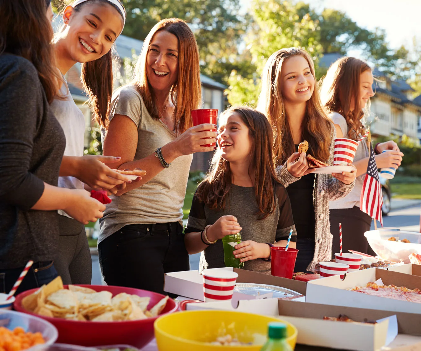 Neighbors hosting a block party together.