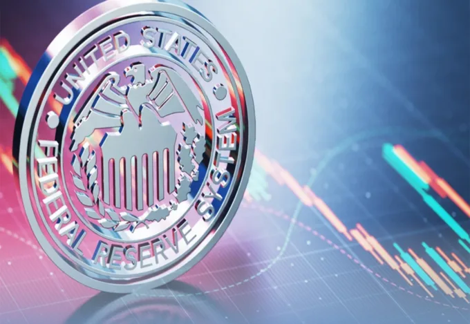 A graphic of the US Federal Reserve logo with a graph in the background.